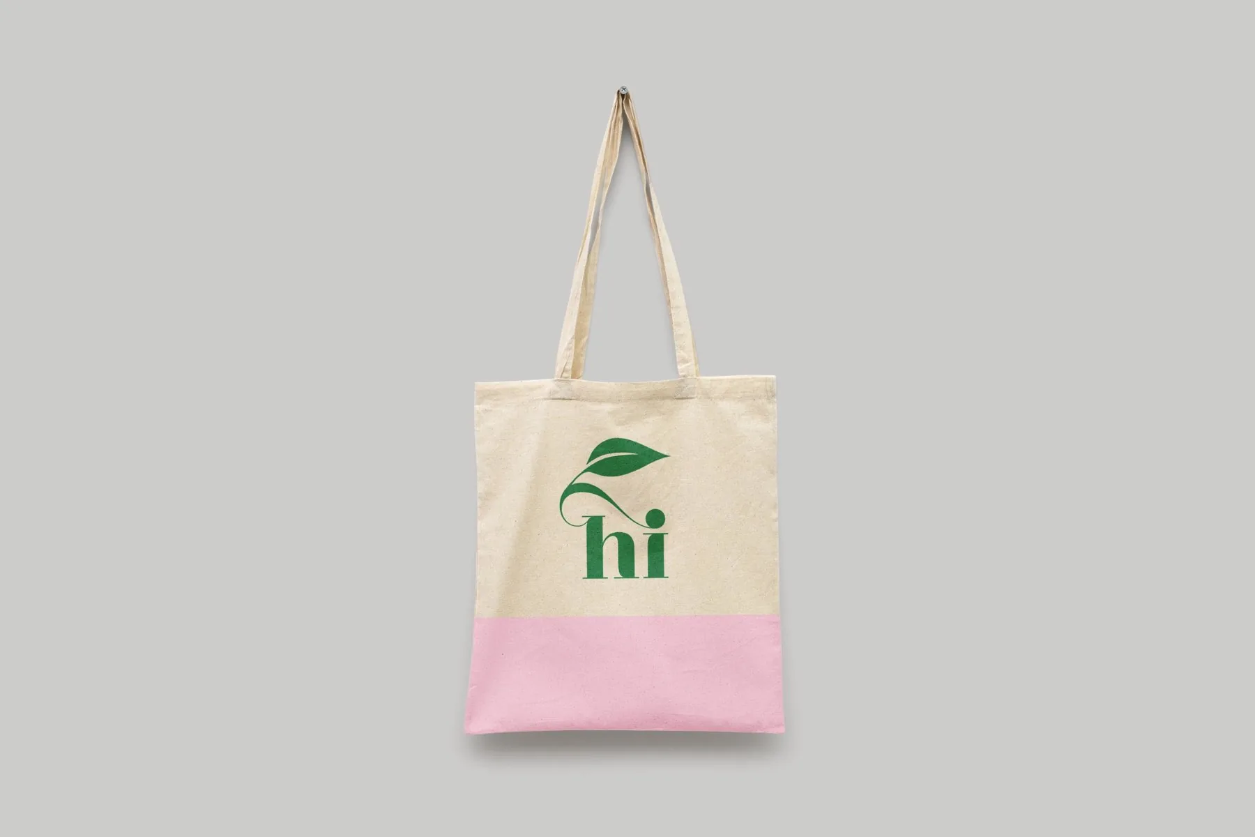 Canvas tote with the green hi mark and a pink lower band
