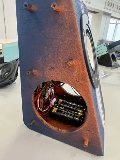 Printed cabinet with battery pack mounted inside